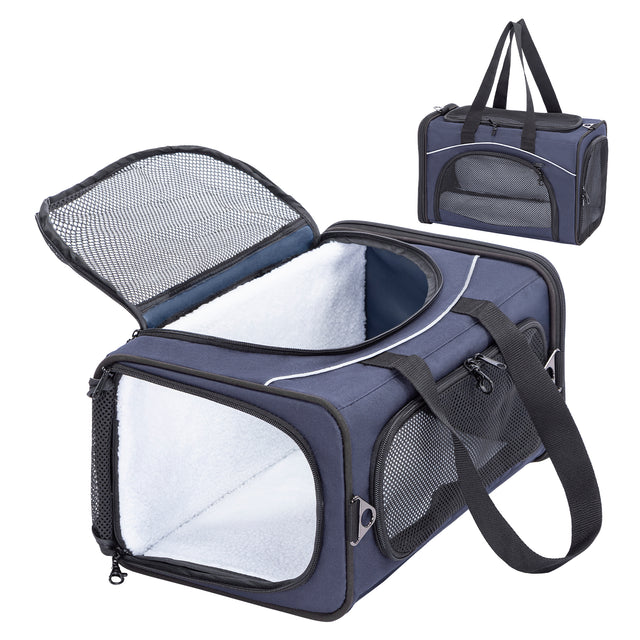 Navy cat carrier with top mesh flap open reveals soft white lining, ventilation panels, and inset of upright closed shape.