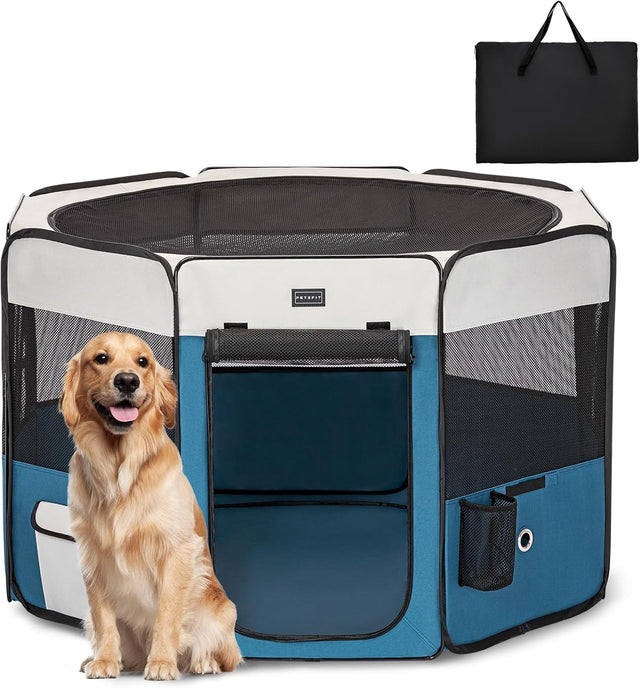 Large blue gray pet playpen with open front entry, mesh ventilation, and carry bag, shown beside a seated golden retriever.