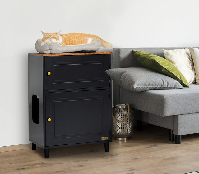 Black Petsfit litter box cabinet serving as a stylish side table with plants and books, blending seamlessly with home decor