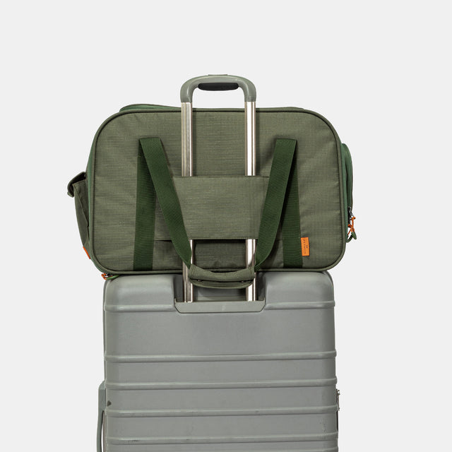 Front view of PETSFIT WildPath Pet Travel Carrier in military green with orange interior