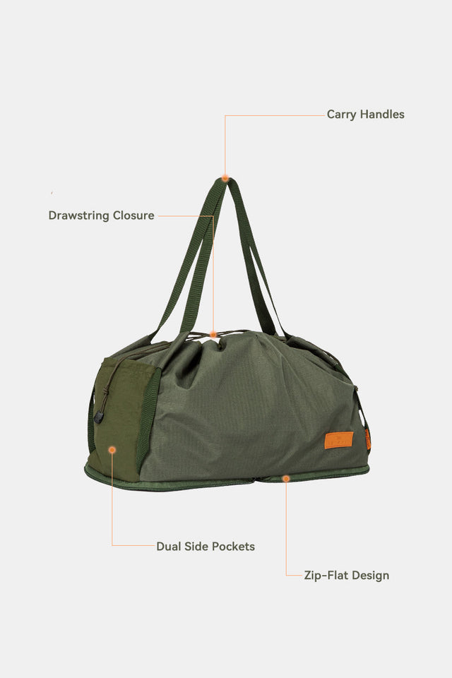 Olive backpack for dog travel gear, with mesh panels, front bungee cords, and multiple zippered pockets.