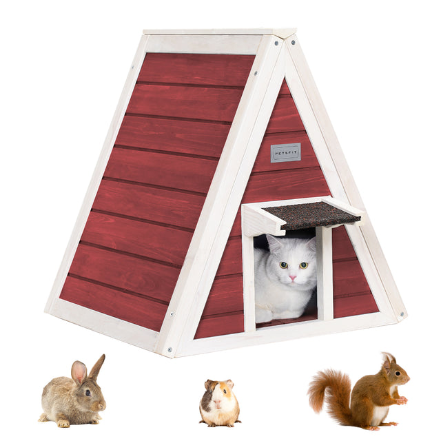 White cat resting inside the red A-frame cat shelter, showing the covered doorway and cozy interior space for small pets.