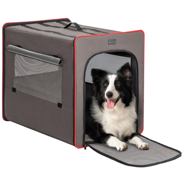 Border collie relaxes at the doorway of a brown travel dog crate with red trim, breathable mesh panels, and rolled side curtain.